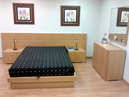 Dormitorio en chapa de roble